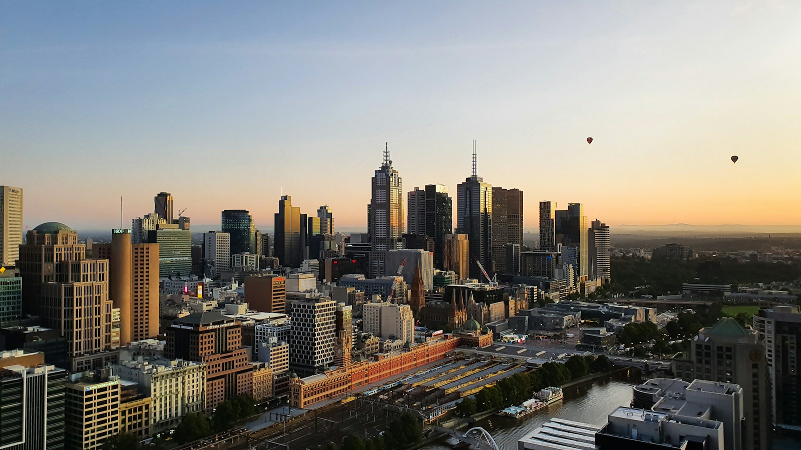 Melbourne skyline and Flinders Street Station at sunrise